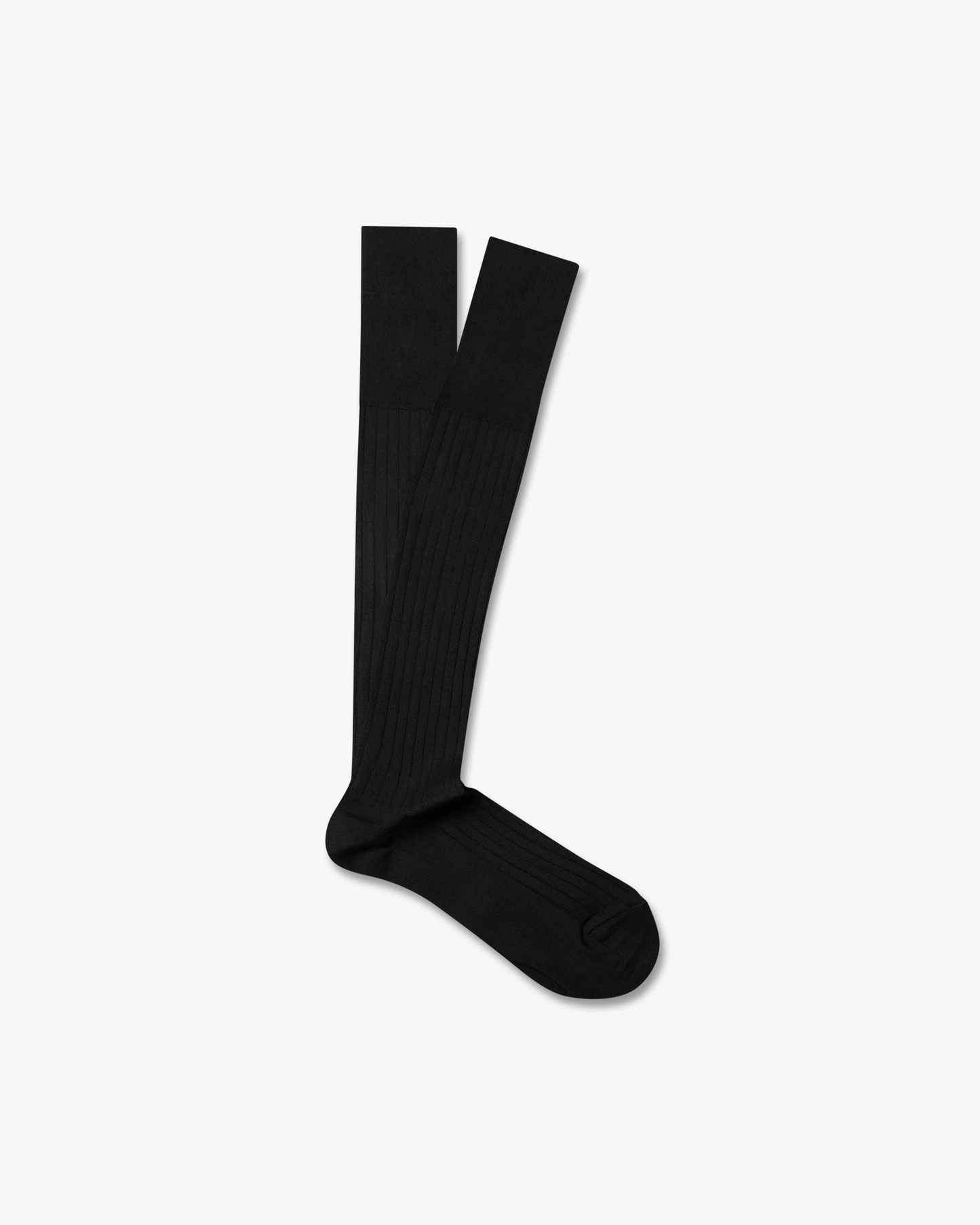 A pair of ribbed Nils – Knee-High Cotton Socks in black, laid flat against a white background.
