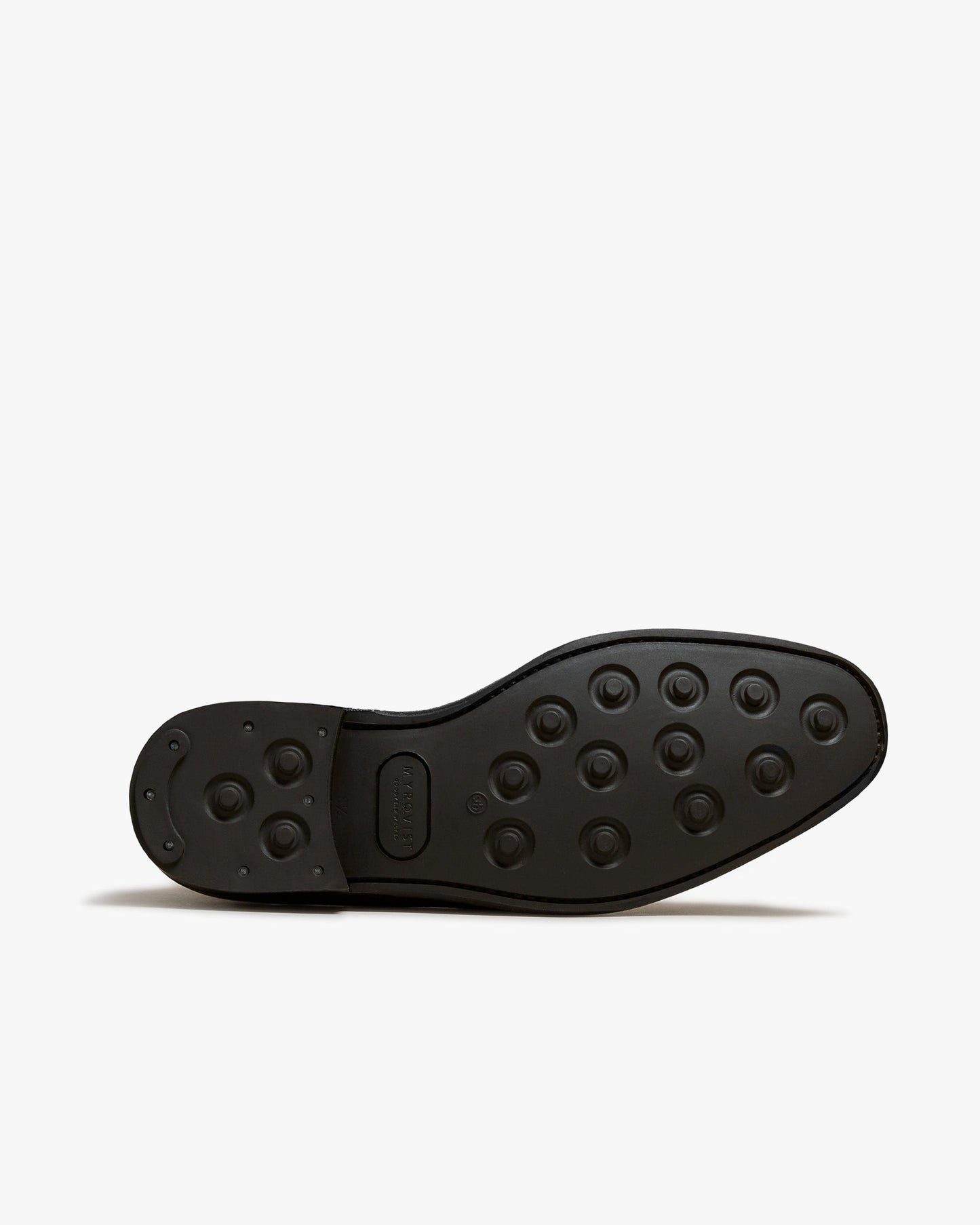 Close-up of the studded rubber sole on Granhult in dark brown calf, highlighting the durable construction and grip designed for versatile wear.