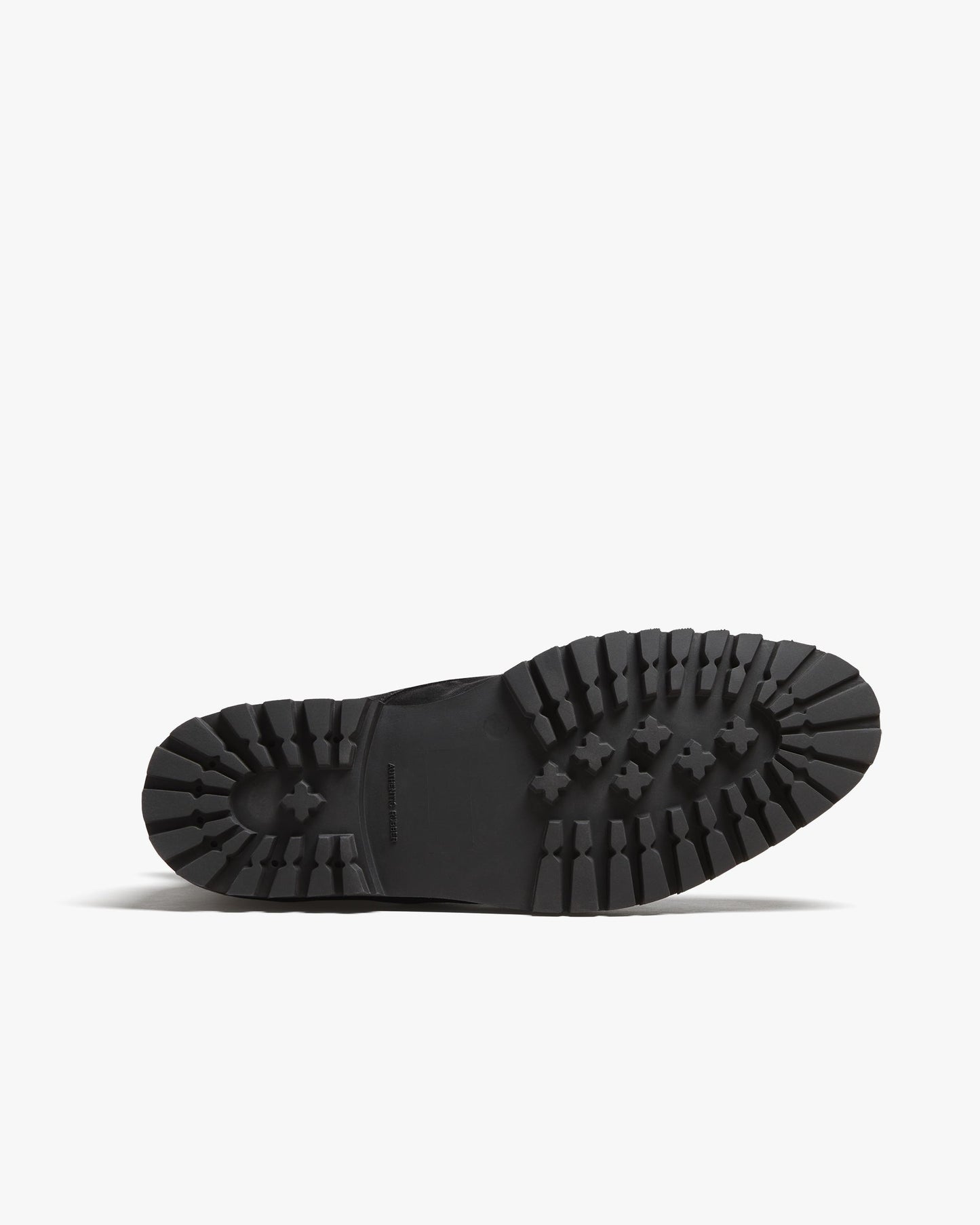 Close-up of the Gothem II in black suede showing the rugged lug sole with deep tread, designed for reliable traction and durability in winter boots for men.