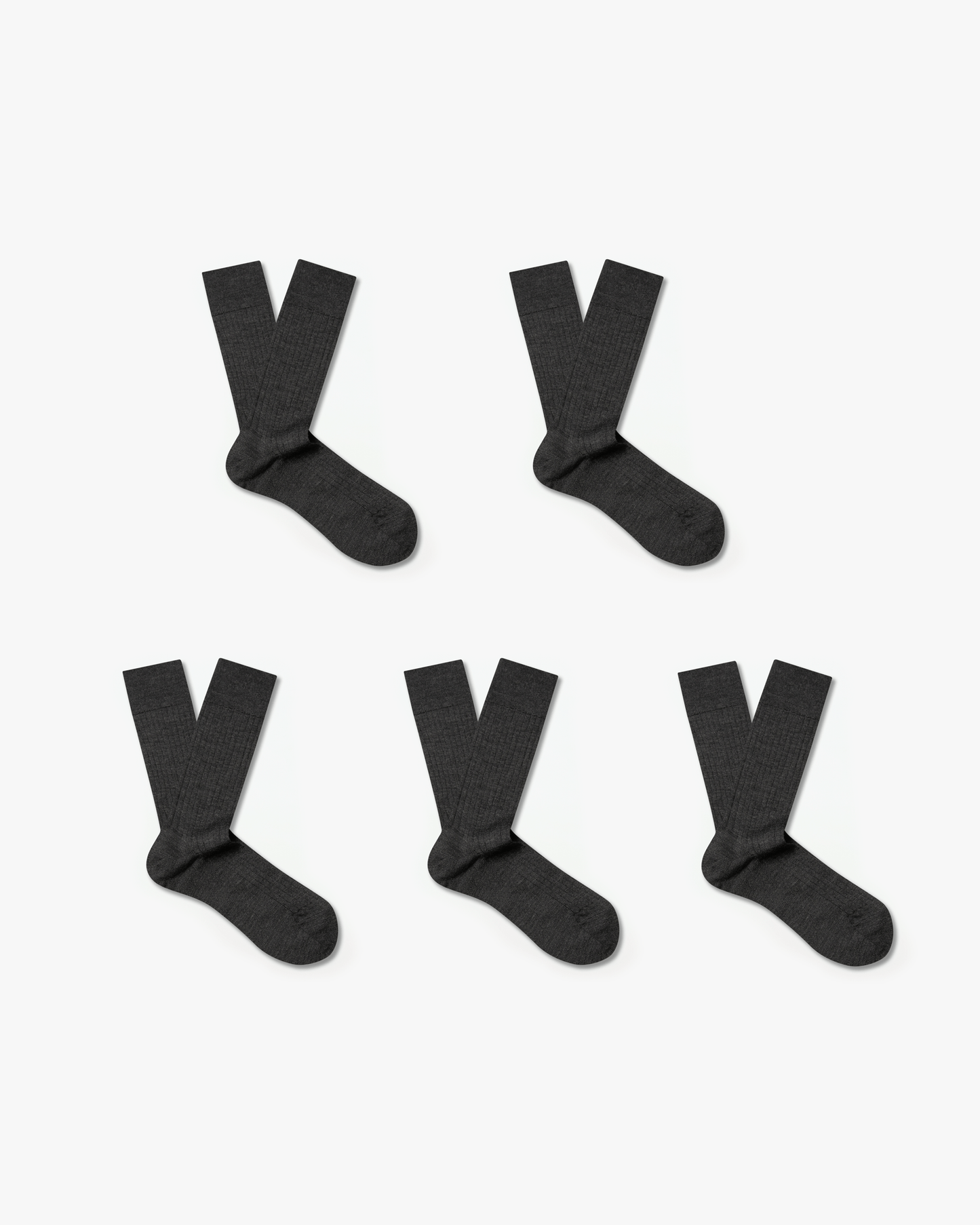 Five pairs of Ludvig merino wool socks in charcoal gray, each featuring a ribbed, calf-high design arranged neatly on a white background.