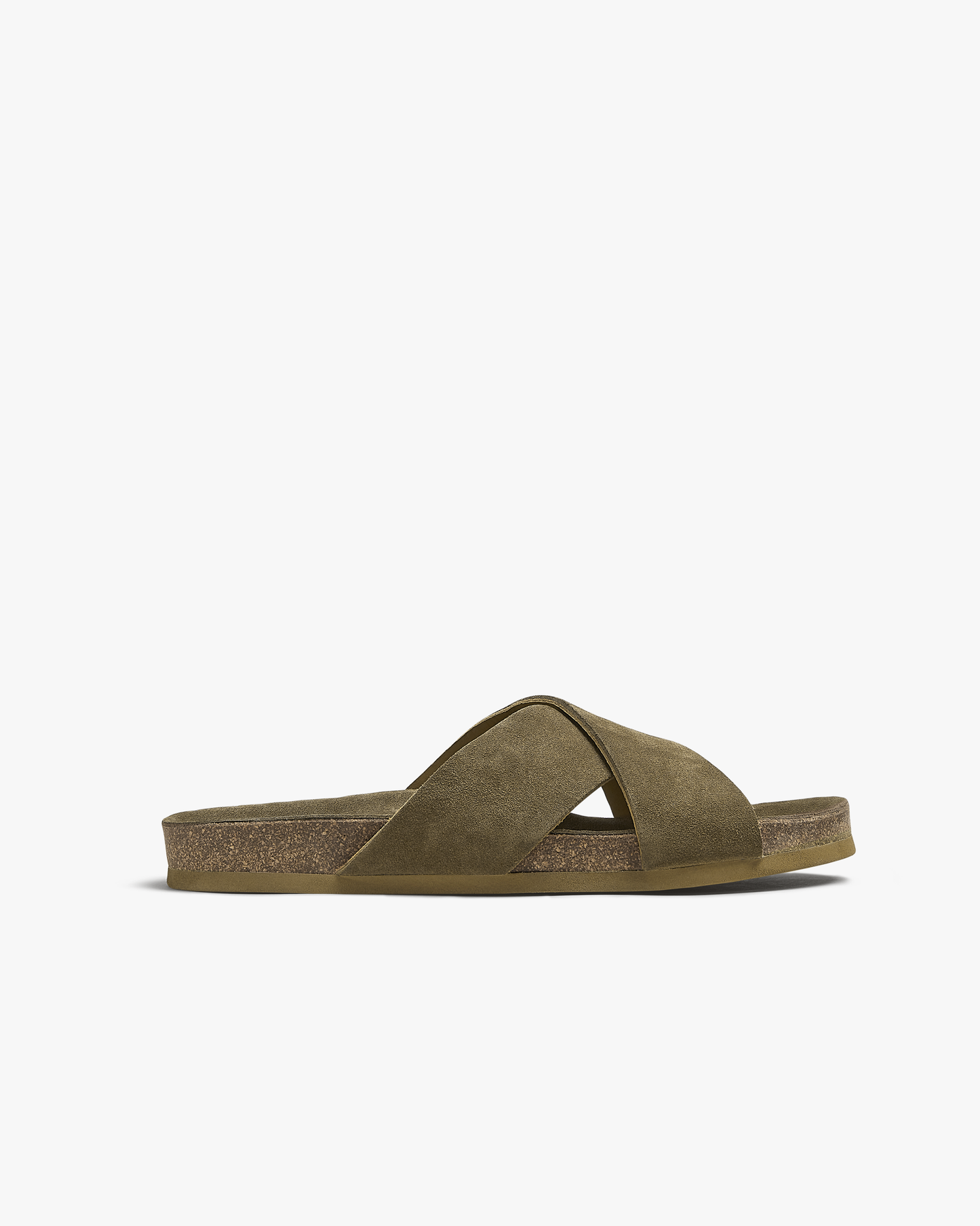 Men’s sandal featuring soft moss green suede cross-over straps, an open toe, and a moulded cork footbed with a slim, durable sole, shown in a side profile against a white background.