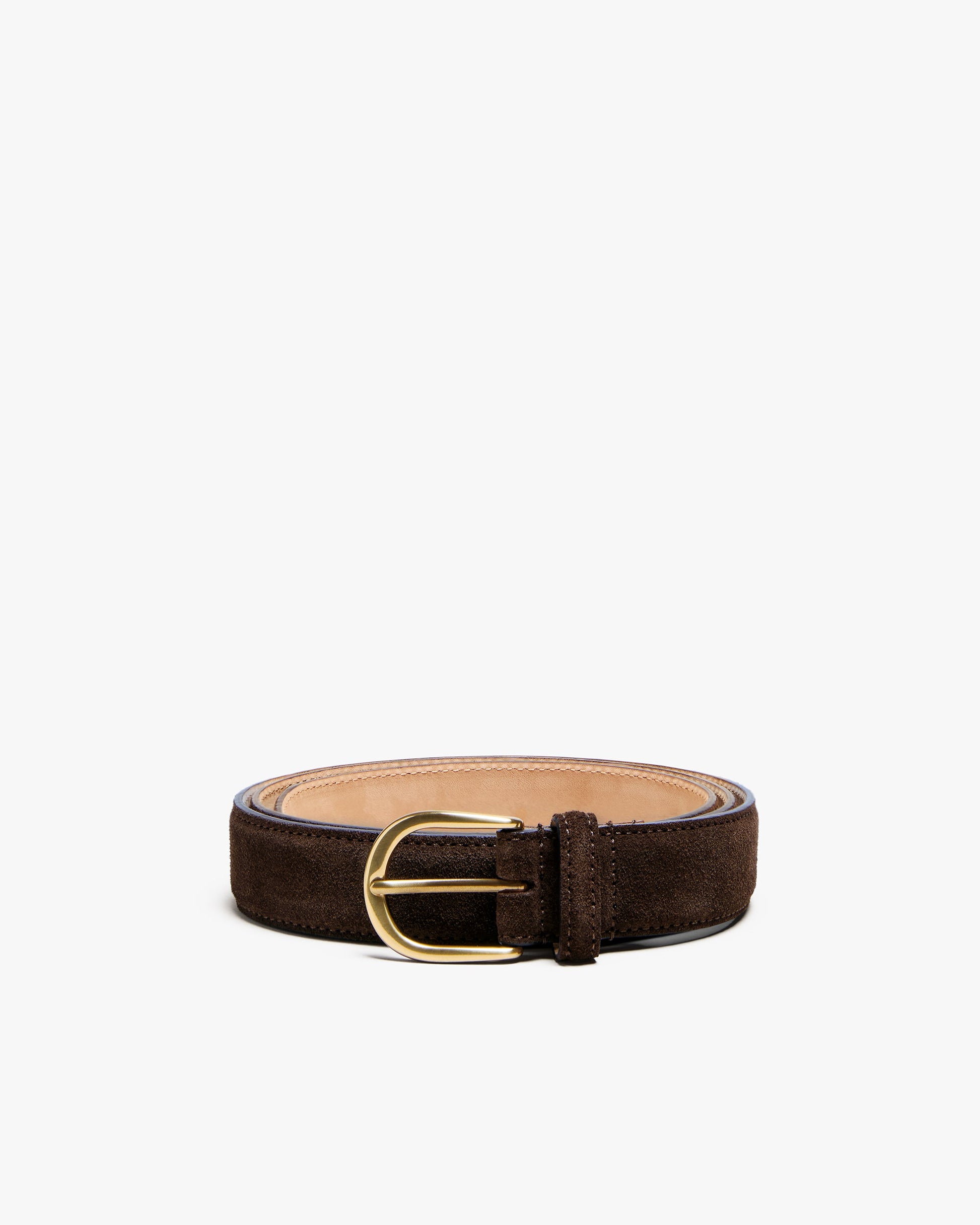 Dark brown suede belt with a round gold buckle, featuring soft leather lining and precise stitching, displayed coiled on a white background.
