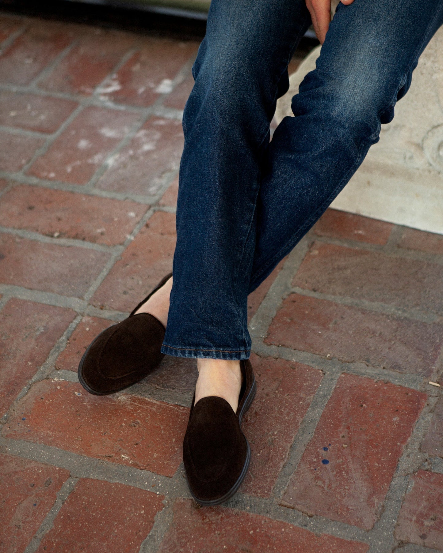 Brännö II in dark brown suede worn with casual denim, showcasing the loafer's rich suede texture, clean silhouette, and versatility for relaxed everyday style.