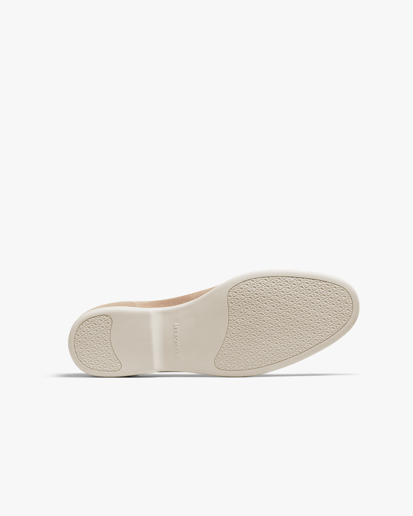 Brännö II in sand suede shown from below, featuring a textured white rubber sole designed for grip and flexibility, ideal for versatile summer wear.