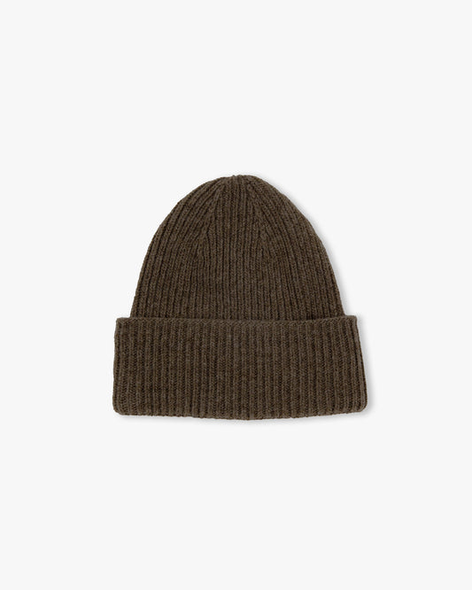 A close-up studio shot of the Hat – Merino/Cashmere – Brown, highlighting its ribbed texture against a white background.