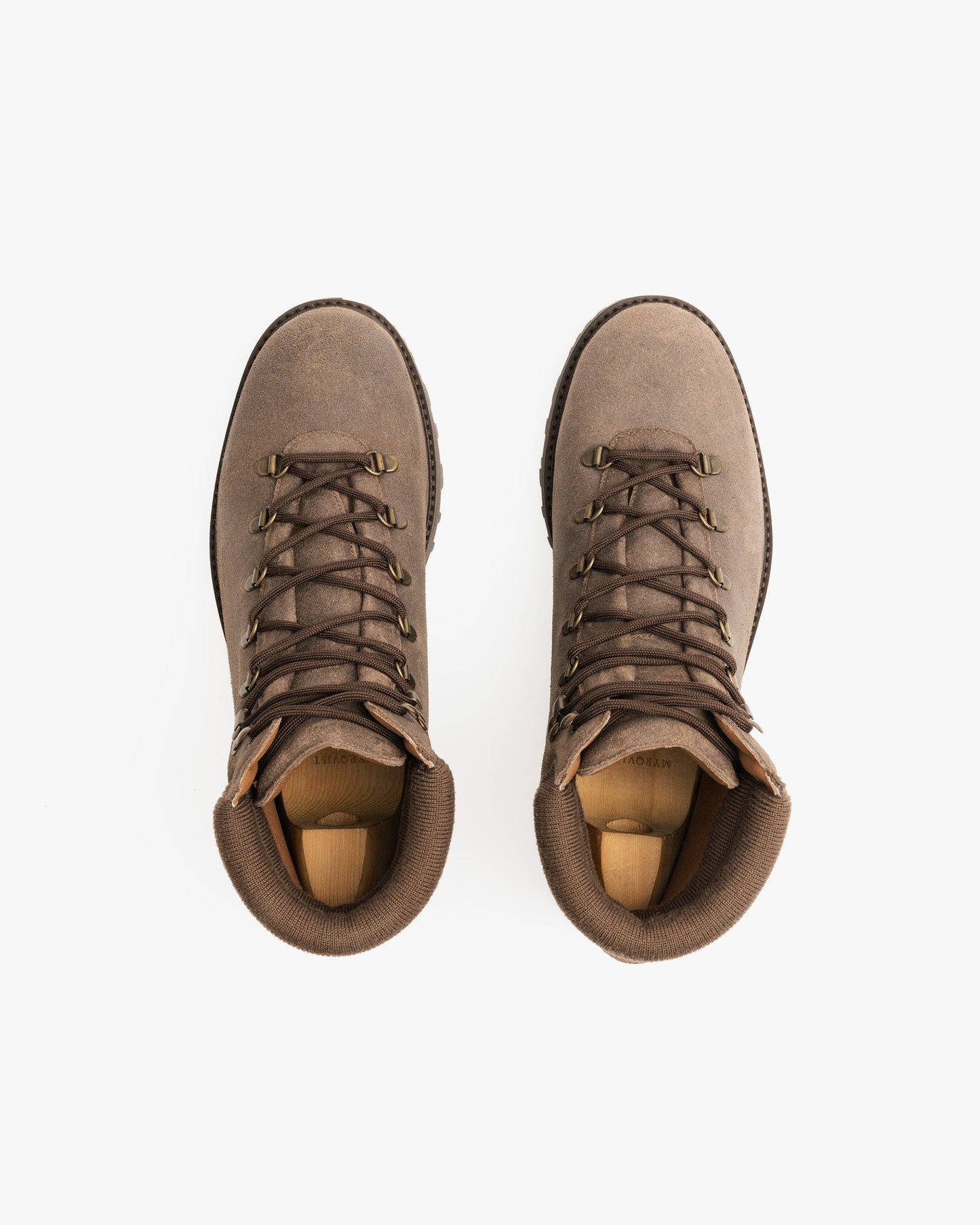 Duved in taupe waxed suede shown from above, highlighting the textured suede finish, brass-finished eyelets, padded collar, and sturdy hiking laces.