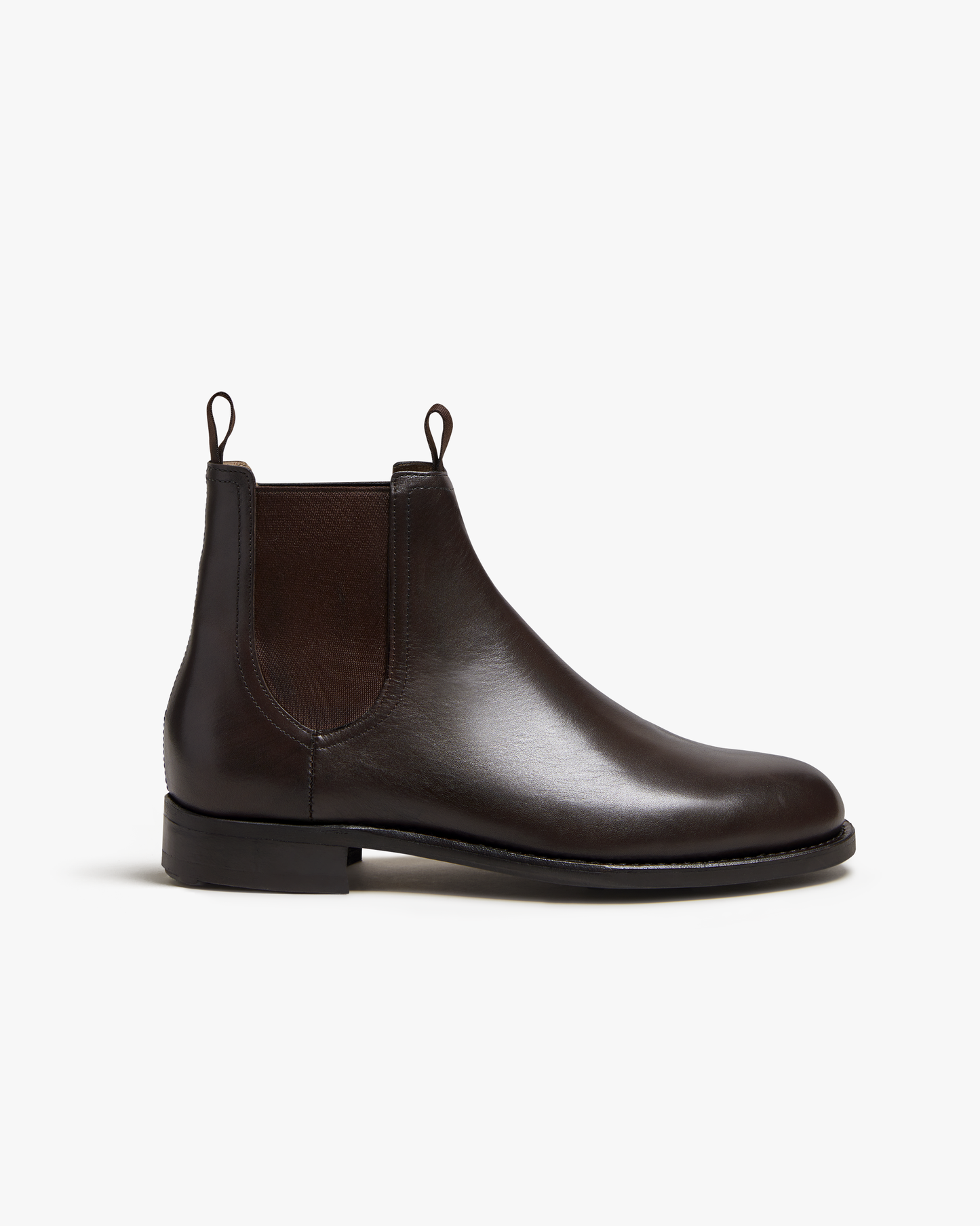 Elfvik Chelsea boot in dark brown calf leather featuring a smooth, polished finish, elastic side panels, and twin pull tabs, shown in a side profile on a white background.