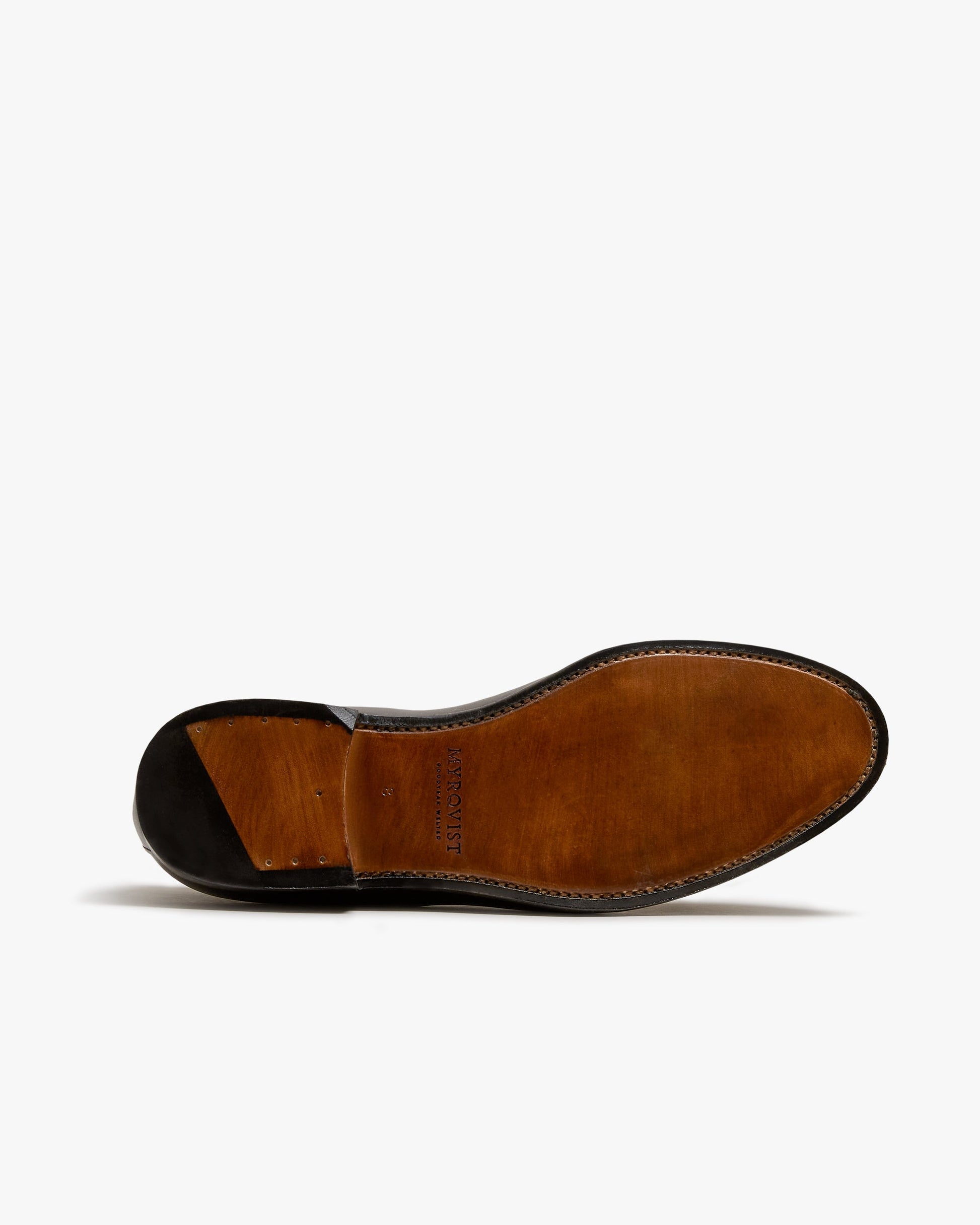 The single leather sole of Mölle II in dark brown calf is shown from below, featuring fine stitching and the Myrqvist logo stamped at the midfoot, highlighting the craftsmanship and durability of this classic men's loafer.