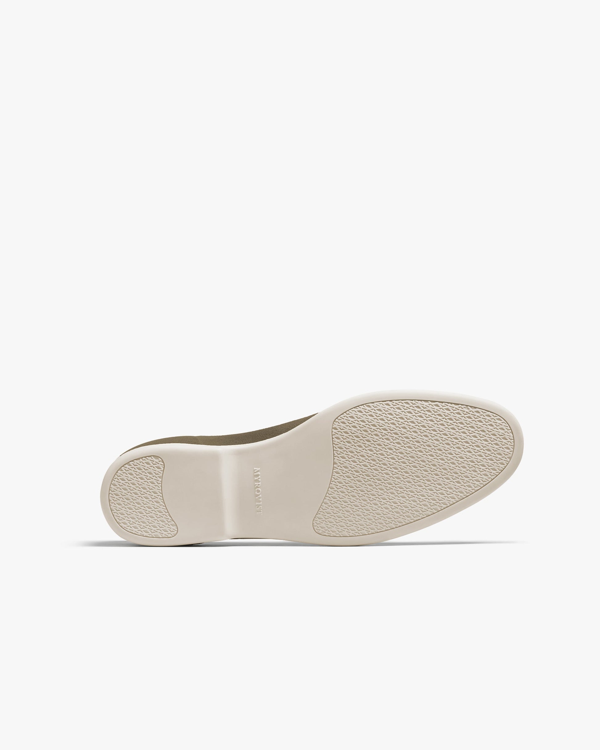 Brännö II in moss green suede shown from the bottom, highlighting the textured white rubber sole designed for flexibility, comfort, and grip.