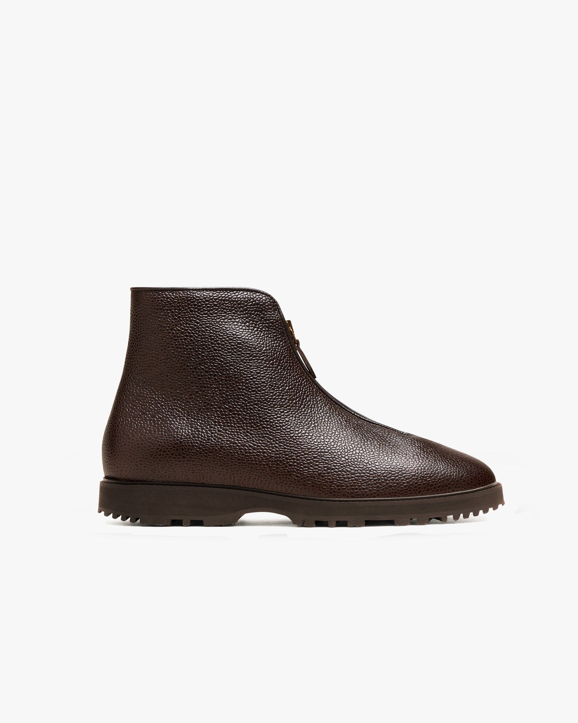 Side view of Funäs in dark brown country calf, showcasing its textured leather upper, central zipper with leather pull, and sturdy Explorer sole designed for grip and comfort.