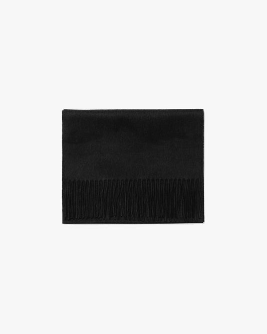 Studio shot of the Wool Scarf – Black, folded neatly to showcase its texture and fringed hem.
