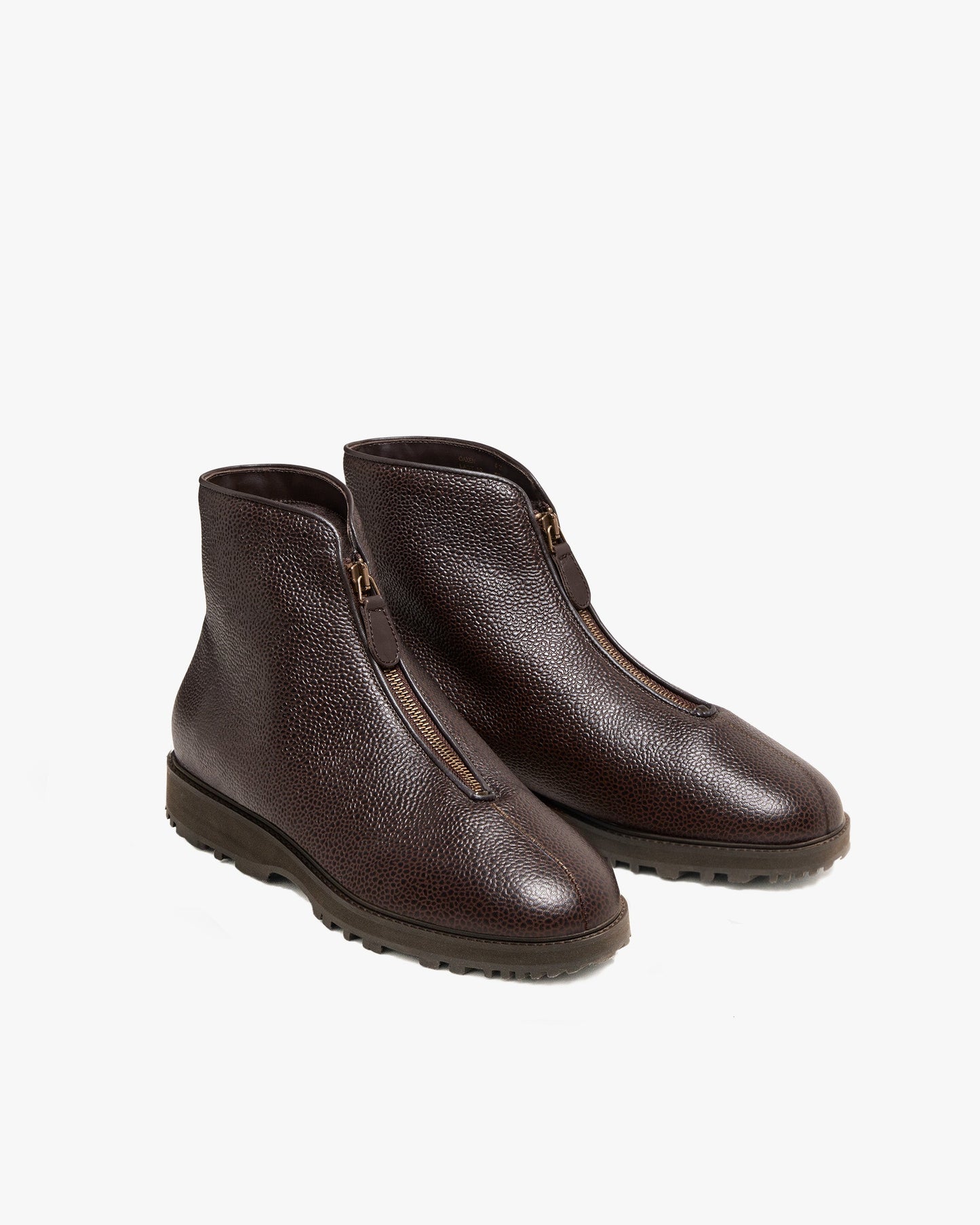 Pair of Funäs in dark brown country calf, featuring a textured leather finish, central zipper closures, and sturdy Explorer soles designed for both city and outdoor wear.